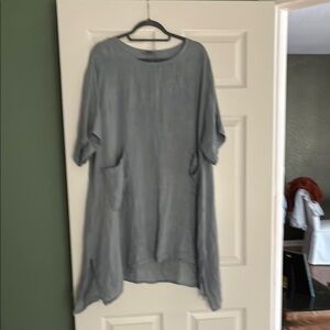 Blue linen dress with pockets.